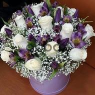 A white memorial - Box with flowers